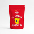 A red stand-up pouch of Insomnia Coffee Breakfast Tea with a yellow mug graphic and white text, set against a clean white background.